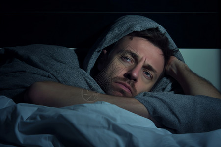 睡眠质量不好的男人睡觉高清图片素材