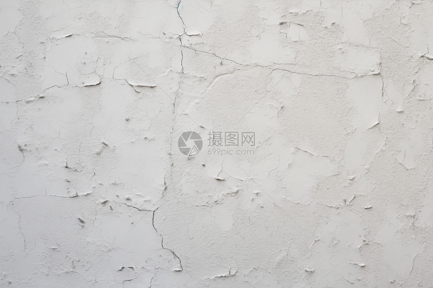 开裂的白色石膏灰泥墙面图片