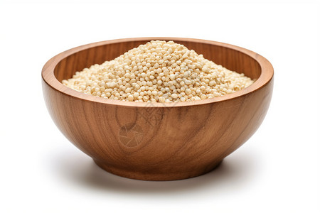 高粱米饭白色背景上的木碗中的高粱米背景