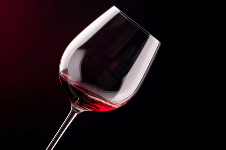 酒杯中的红酒背景图片