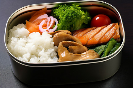 鲑鱼子饭不锈钢饭盒里的食物背景