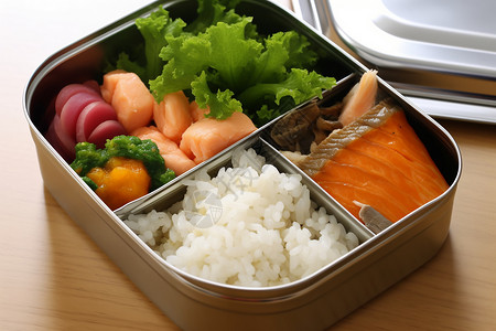 鲑鱼子饭不锈钢饭盒里的餐点背景
