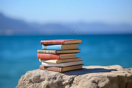 书与石头素材海边石头上的书背景