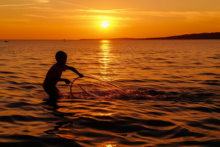 捕鱼的男孩落日时小男孩在捕鱼背景