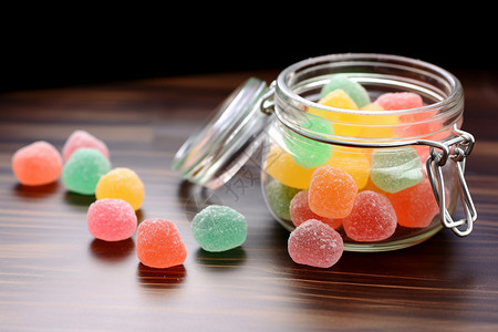 彩色硬糖彩色玻璃罐里面的糖果背景