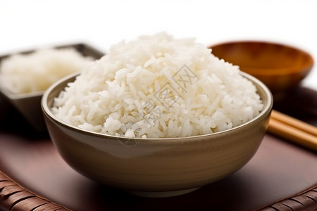 瓷碗中的大米饭高清图片