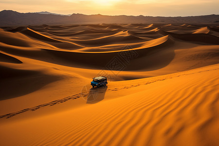 汽车在沙漠中行驶背景图片