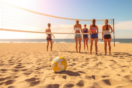 玩沙滩排球的女人背景图片