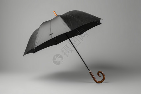 一把雨伞一把实用的黑色雨伞背景