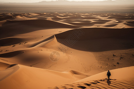 沙漠中冒险的人背景图片