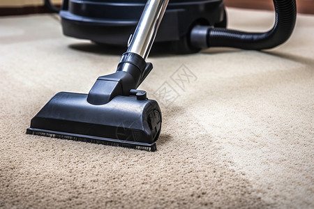 清洁地毯的吸尘器背景图片