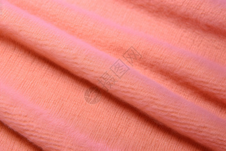 柔软的粉色织物布料图片