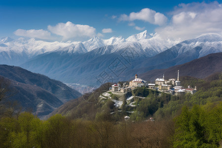 春季雪山下的城镇图片