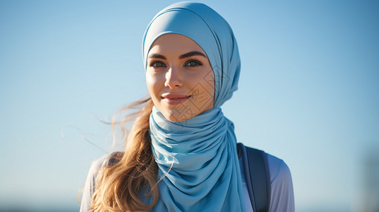 隔汗巾戴着蓝色头巾的女人背景