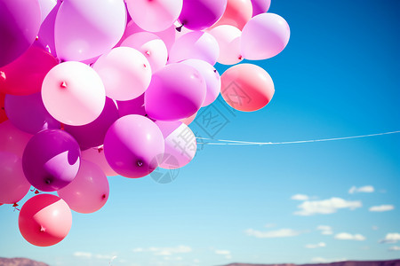 天空中的粉色气球背景图片