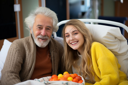 病床上幸福的祖父和孙女图片素材
