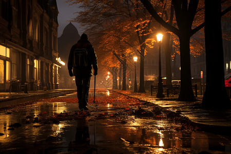 城市夜晚孤独的捡垃圾工背景图片