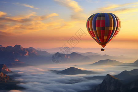 黄昏时山间的热气球图片