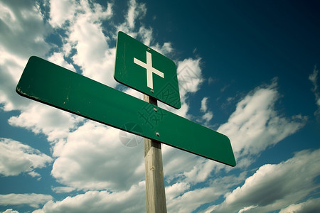 双色十字架标识道路上的绿色标牌背景