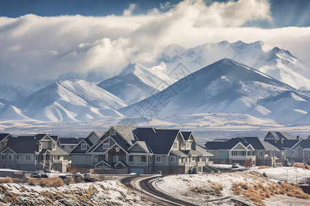 雪山下的房屋建筑景观图片