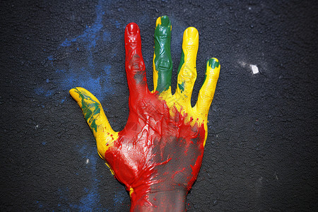 奥运会油漆涂抹的手掌背景图片