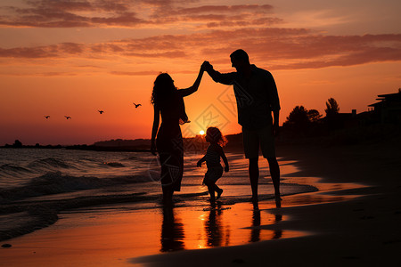 海边幸福的一家人剪影图片