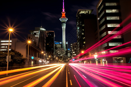 成都电视塔夜景灯火通明的城市道路设计图片