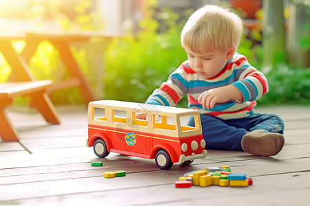 开汽车小男孩户外木板上玩汽车的小男孩背景
