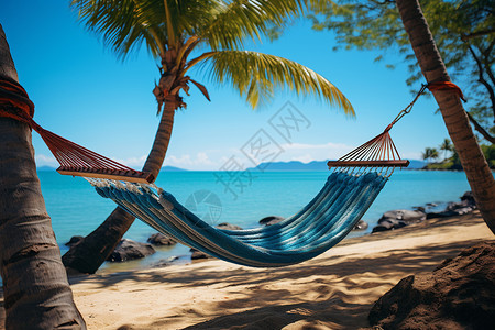 热带地区海滩上的吊床背景图片