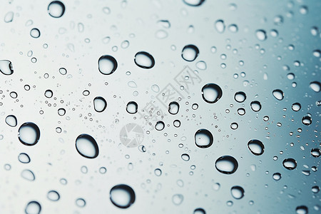 玻璃上的雨水背景图片