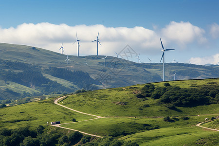 山脉中的风力发电涡轮机高清图片