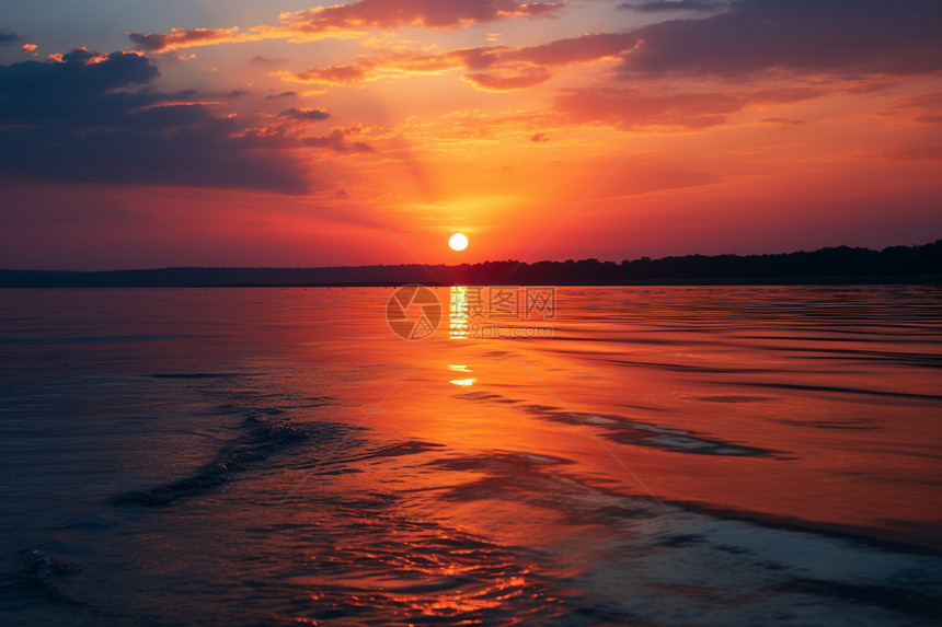 黄昏海滩上的日落图片