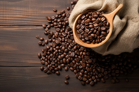 黑色麻布咖啡豆与木勺背景