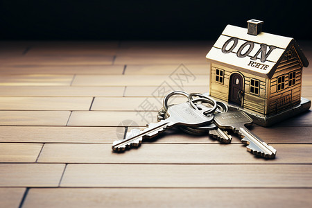 木板上的钥匙和房屋模型背景图片