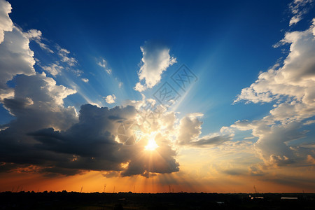 绚丽蓝色光束天空中绚丽的夕阳背景