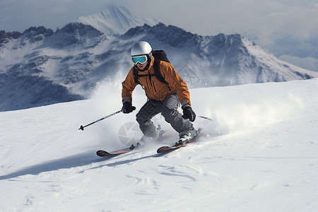 男人在雪山上滑雪图片