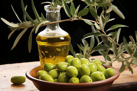 橄榄桌上：一碗橄榄和一瓶橄榄油，还有一颗橄榄背景