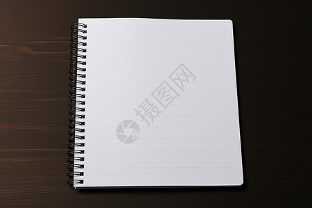 记事本便签本木质桌面上的空白笔记本背景