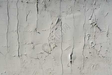 白墙上剥落的一侧有裂缝高清图片