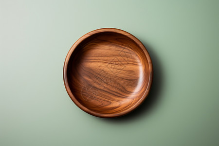 绿色背景上的木质餐盘背景图片