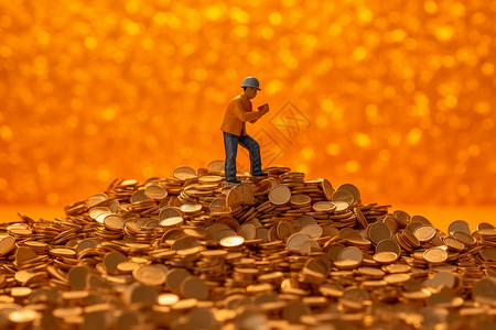 金币堆成山的理财概念背景图片