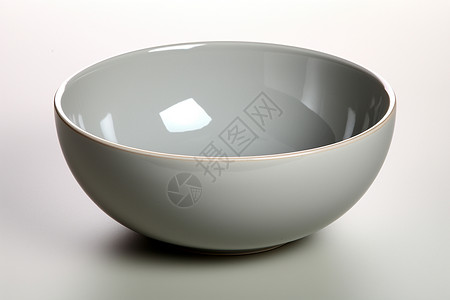 空白的陶瓷碗放在桌子上图片