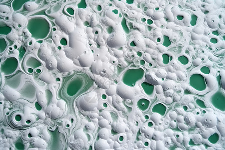 绿色液体中的白色气泡图片