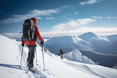 雪山上的攀登爱好者背景图片