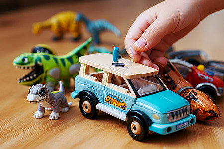 桌子上的玩具桌子上的车辆和恐龙玩具背景