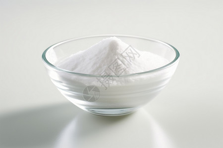 碳酸氢钠玻璃碗里的小苏打背景