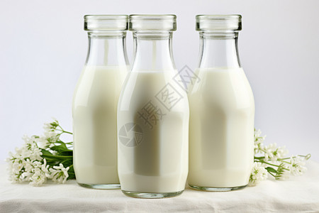 瓶装的鲜奶背景图片