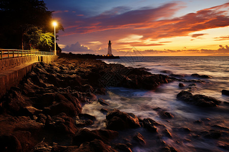 夜幕下的海滩守灯塔背景图片