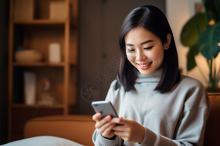 玩着手机的女人背景图片