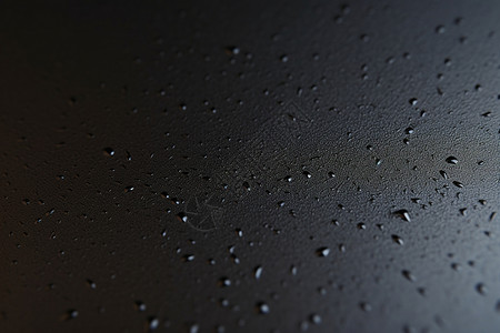 竹叶塑料纹理黑色纹理壁纸上的水滴背景
